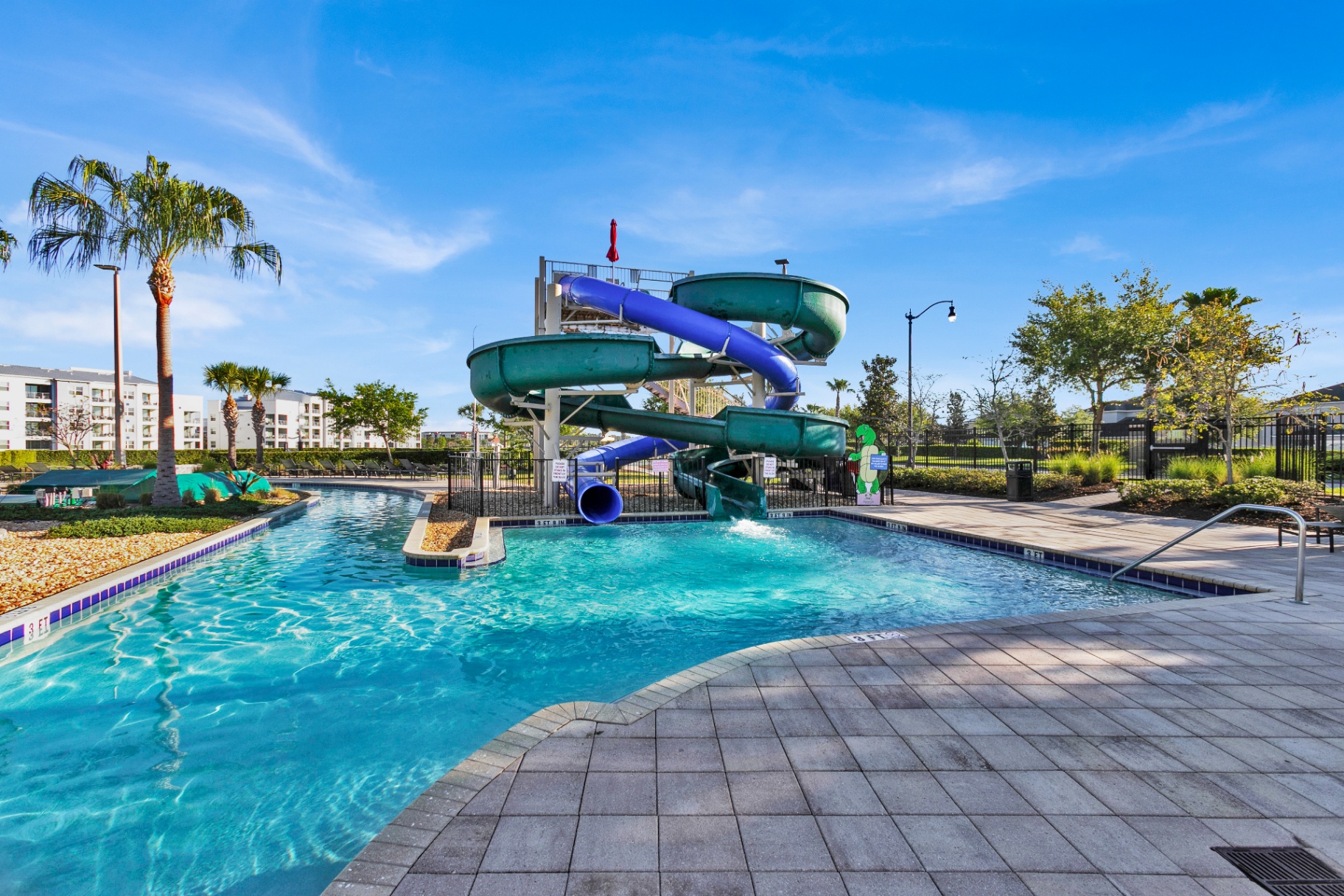 Twisting water slides at the resort pool