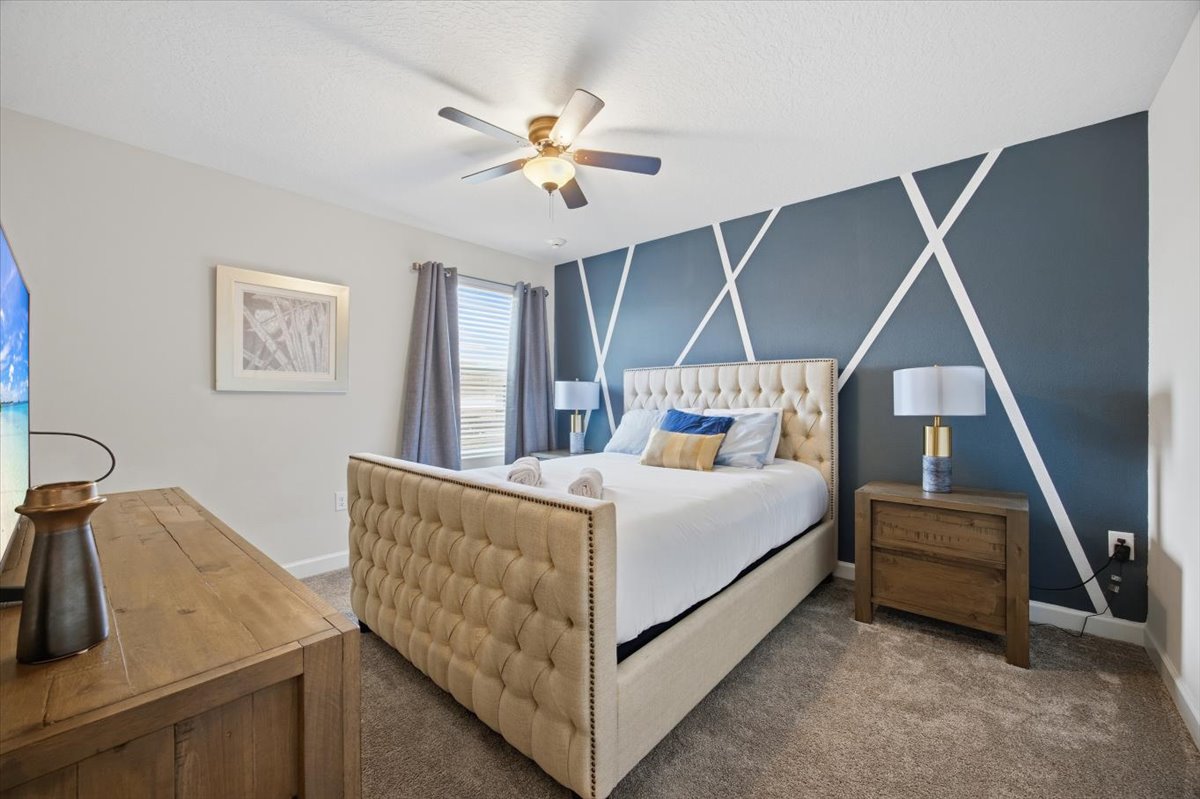 Tufted king bedroom with geometric accent
