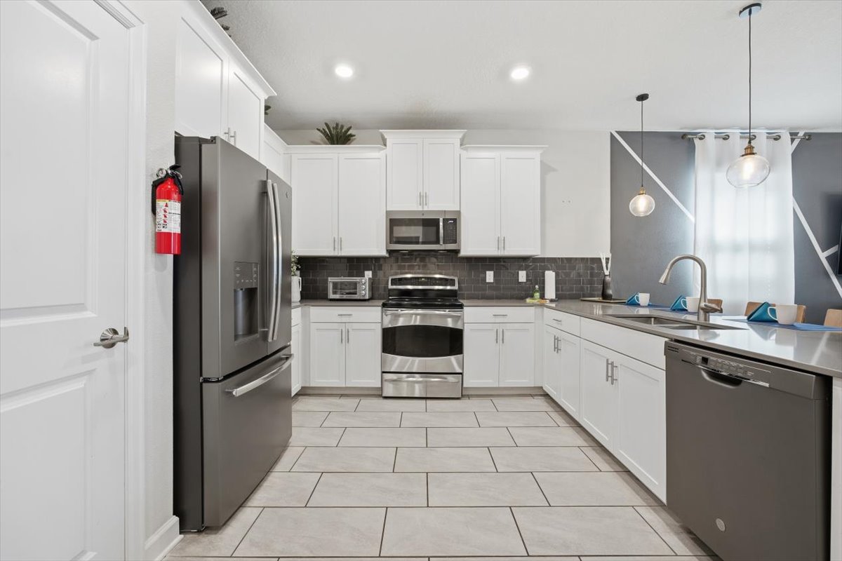 Modern kitchen with stainless appliances
